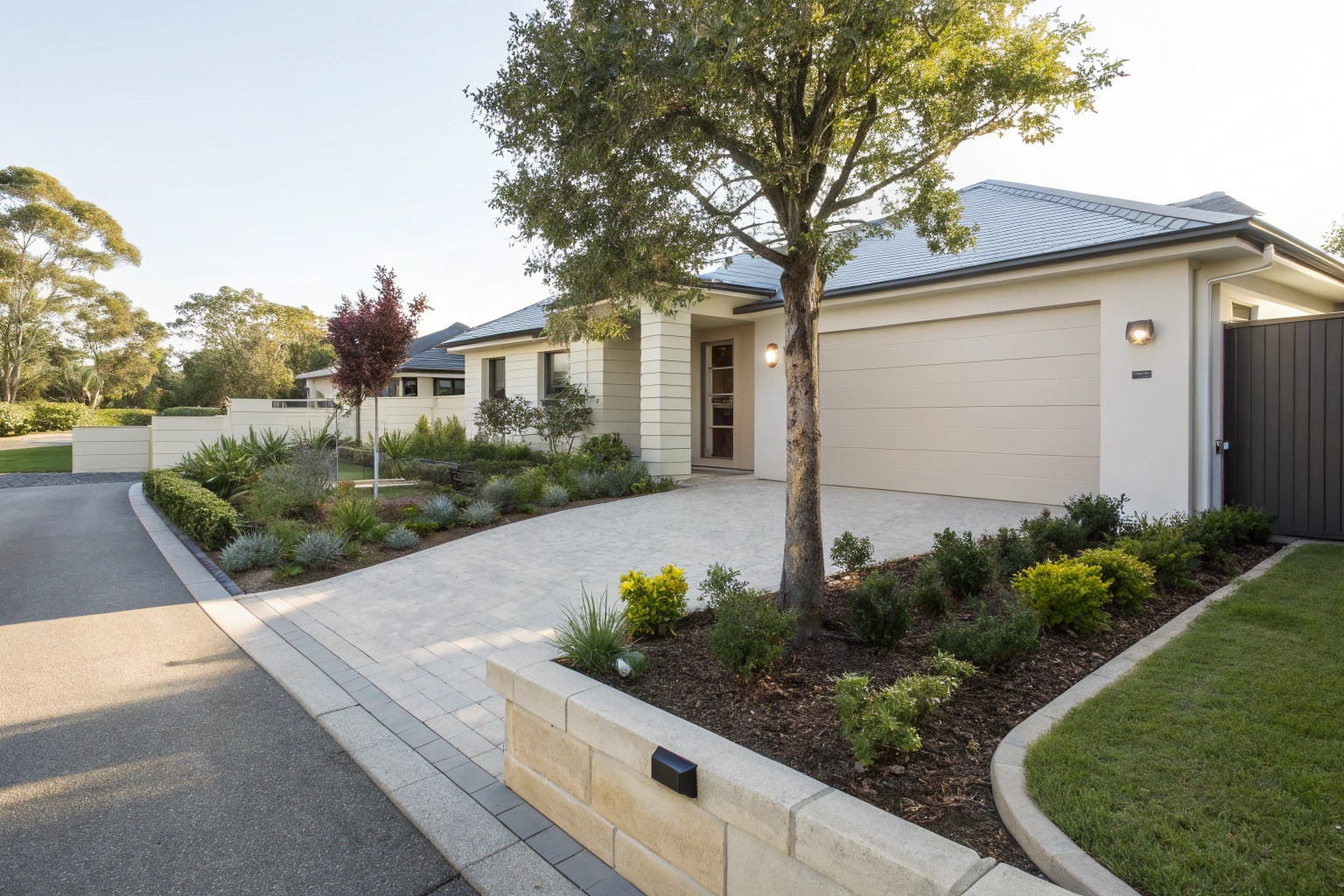 Modern front yard design Central Coast with garden edging and feature plantings