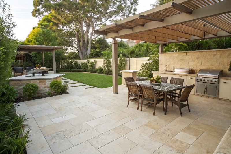 Travertine paver patio with outdoor dining area Central Coast